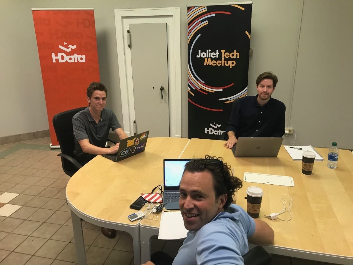 At bottom: HData founder Hudson Hollister aims to grow his technology company from his new office inside Joliet's historic Union Station, built in 1912. 