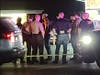 One man was found with a gunshot wound inside a liquor store, and a second man was found dead in a vehicle outside.