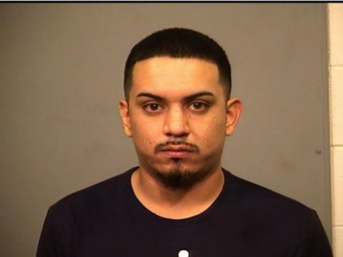 Eduardo Flores was charged in Tuesday night's Joliet shooting that left another person critically wounded. 