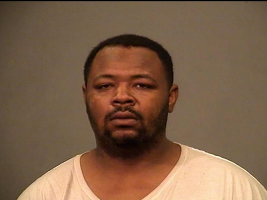 Anthony Dunn of Joliet was arrested after fleeing the BMO Harris Bank in downtown Joliet, police said. 