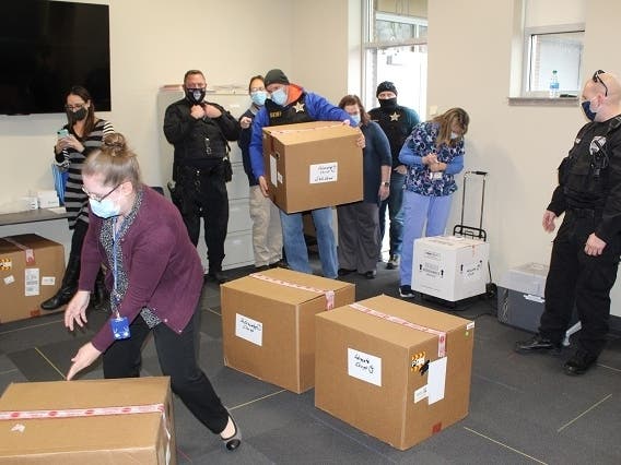 Will County's coronavirus vaccine shipment was distributed among four hospitals to begin vaccinating people in health care settings.