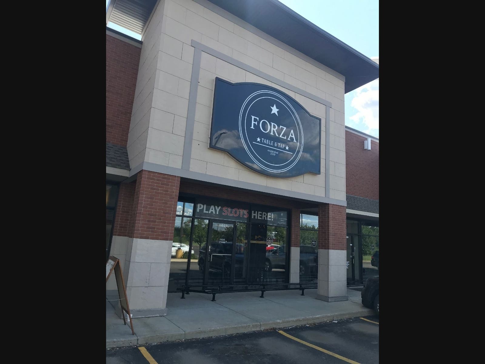 Forza opened in August 2020 at the South Weber Road Plaza, replacing 12 Handles Ale House. 