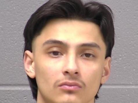 Joliet police determined that Sergio Hernandez was firing a gun at the direction of another motorist on Sunday morning, reports show. 