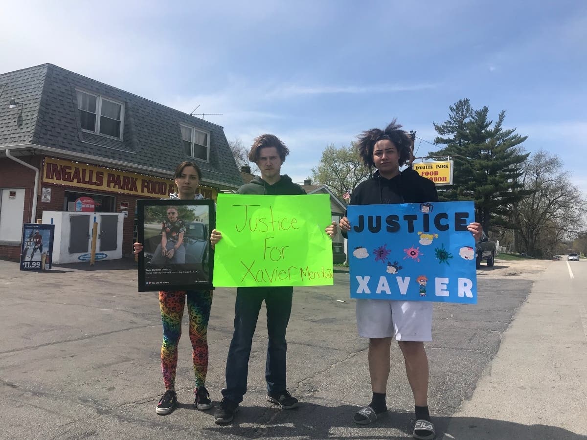 Friends and supporters of Xavier Mendoza held a rally near the Ingalls Park Liquor Store on Washington Street in Joliet. It's been eight months since Mendoza was killed here. 