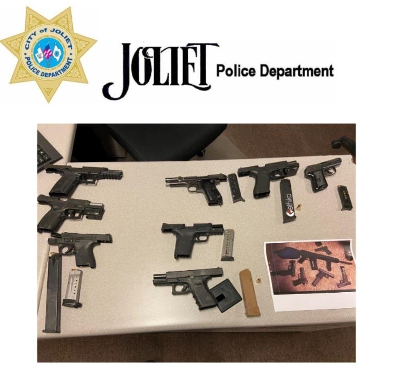 Joliet police recovered eight handguns and one rifle during a raid Thursday night on the city's southeast side. 