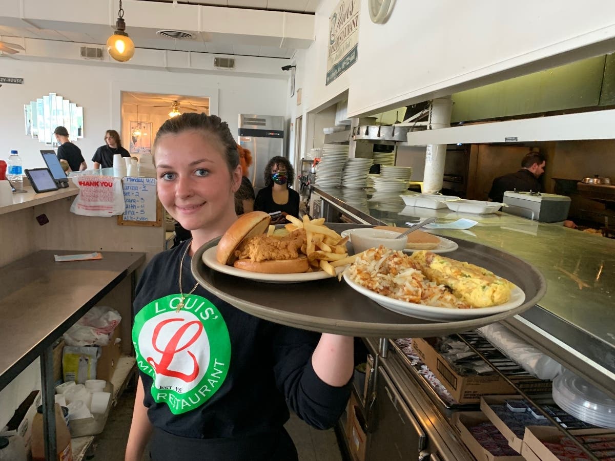 Monday marked the first time in 16 months that customers were able to eat inside the Louis' Family Restaurant at 1001 West Jefferson Street in Joliet. 