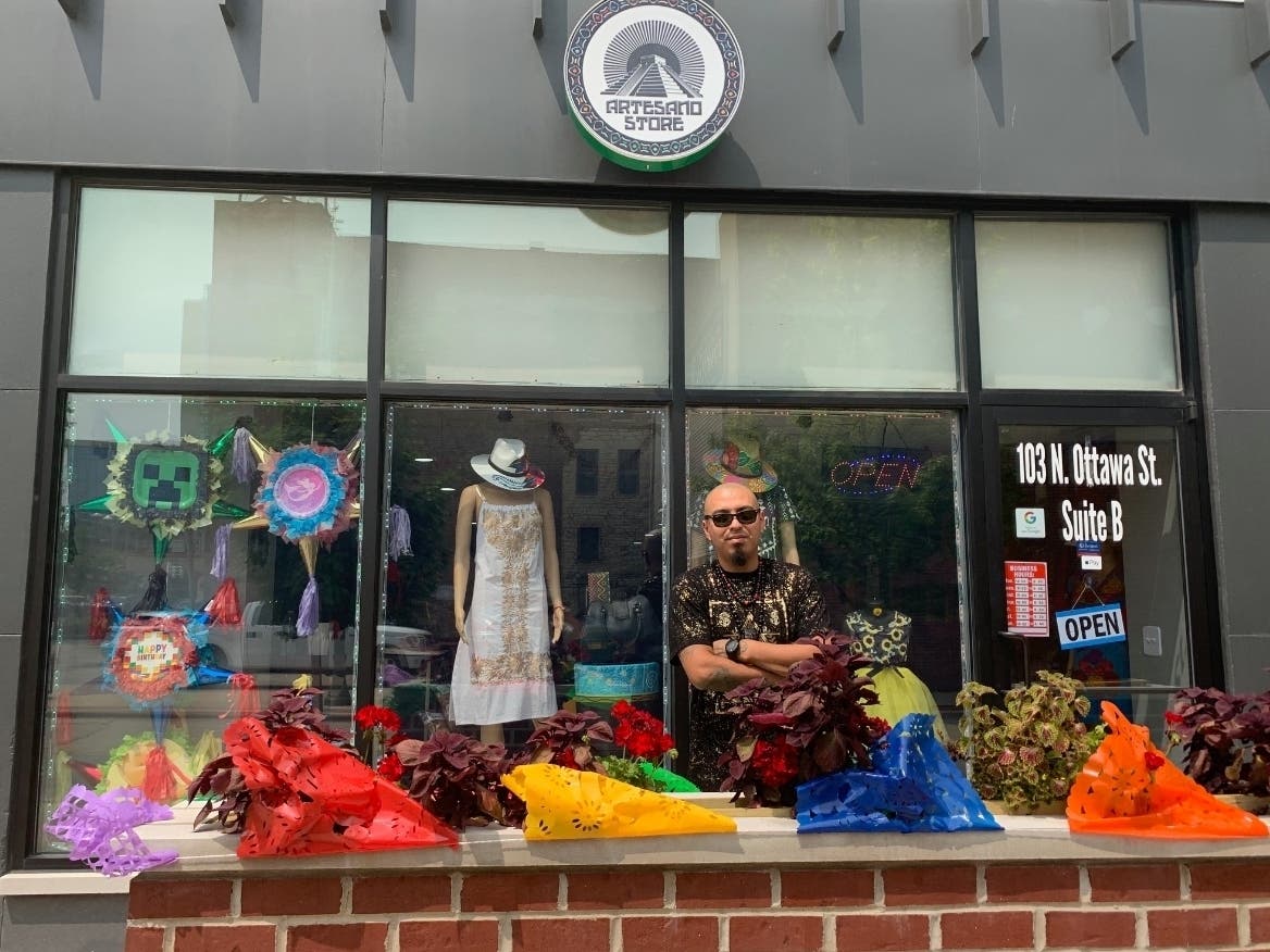 Joliet's Leo Gonzalez said he is proud the Artesano Store carries handmade table runners as well as leather boots, clothing and accessories made by the indigenous people of Mexico.