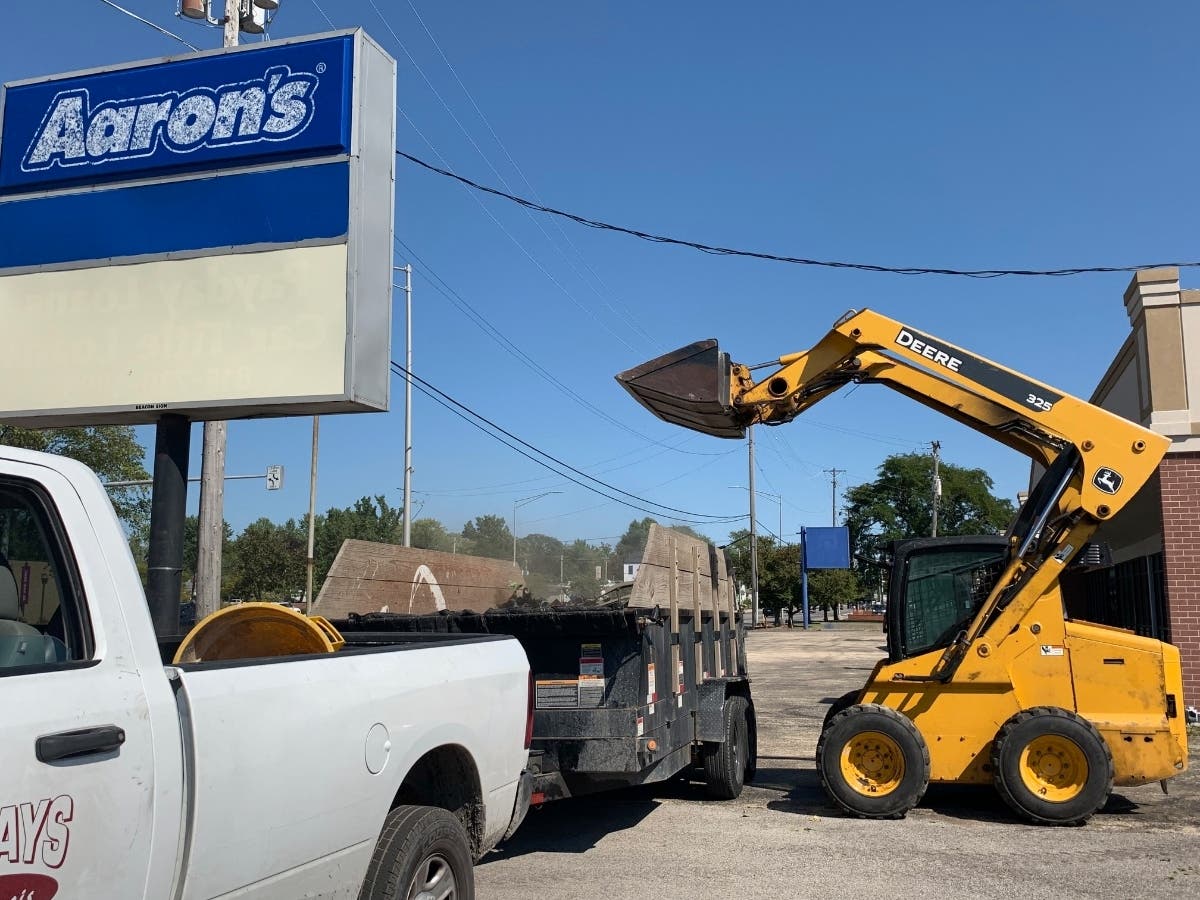 John Bays and his workers with Bays Investments are already taking steps to cleanup the former Aaron's property that has been vacant in recent years on Jefferson Street. 