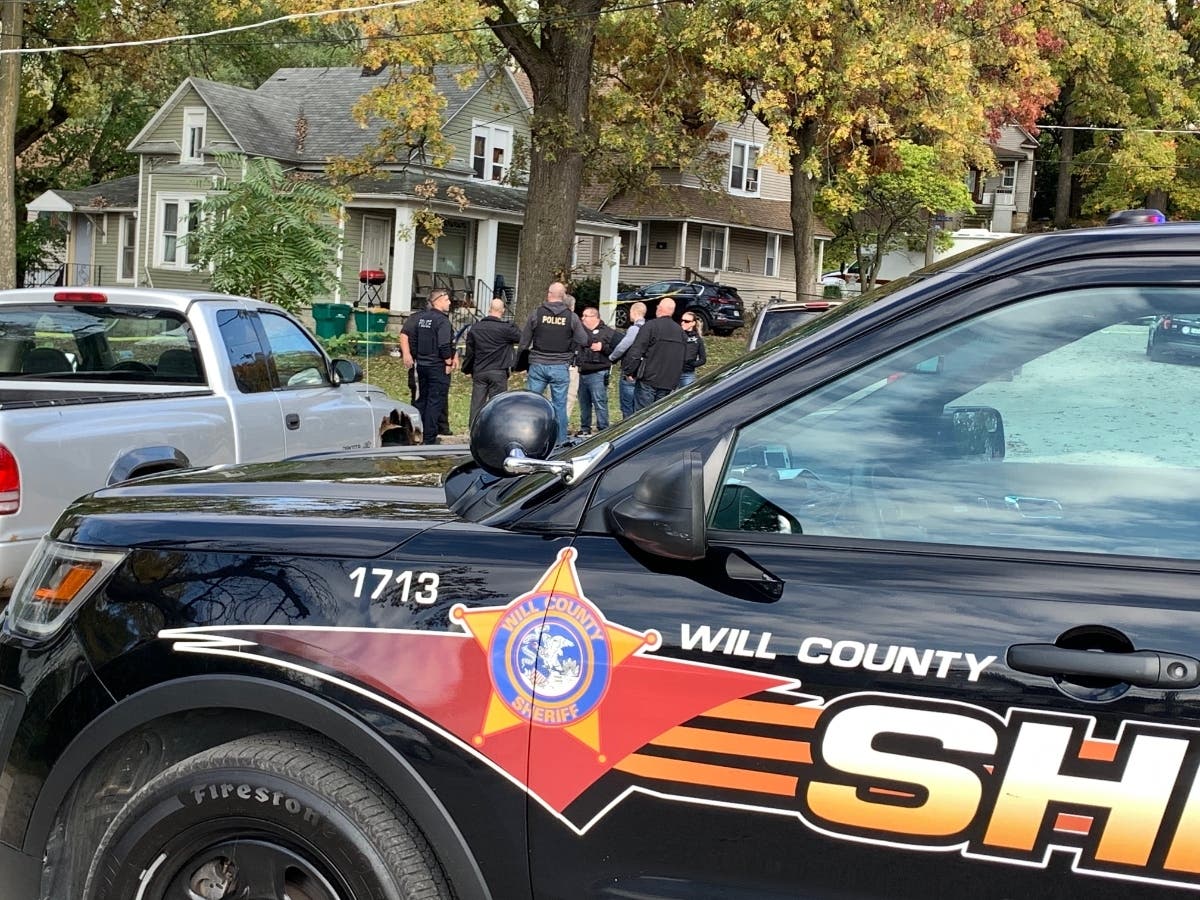 Members of the Will-Grundy Major Crimes Task Force discuss the Halloween party shooting at 1018 East Jackson St. in Joliet that killed two and injured several other guests.  
