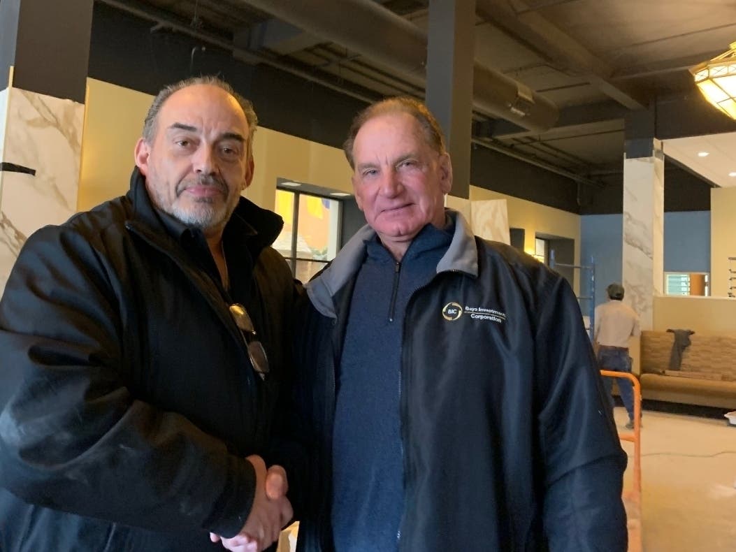 At left, Bill Dimitroulas, owner of downtown Joliet's fanciest restaurant, CUT 158 Chophouse, will be moving into the Two Rialto Square Building now owned by John Bays, at right. 