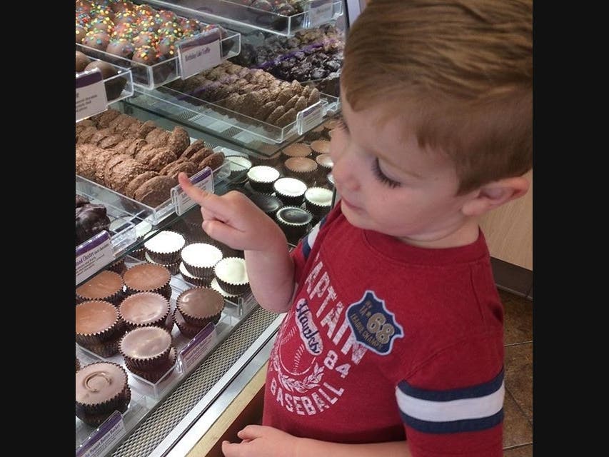Individual stores prepare a variety of caramel and candy apples in full view of the customer using traditional cooking utensils.