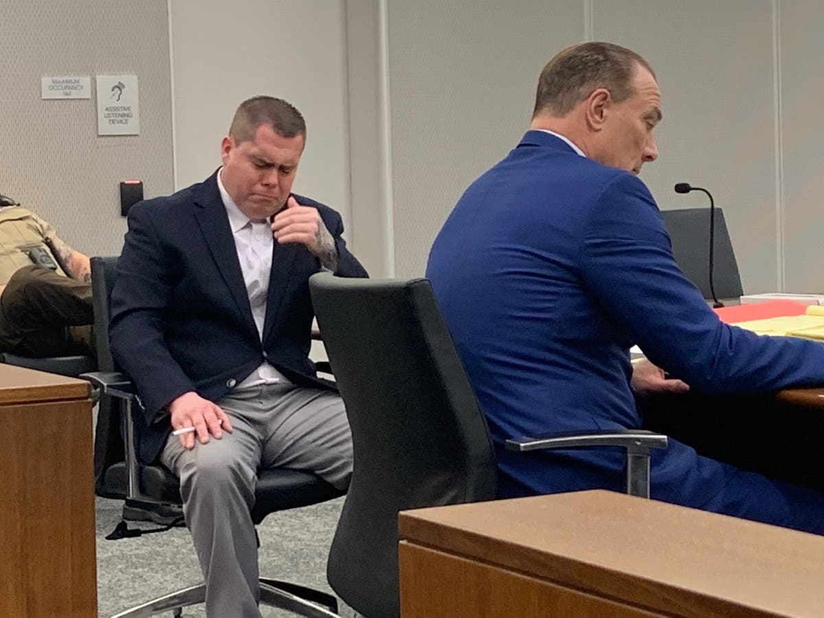 First-degree murder defendant Jeremy Boshears reacts to photos of Katie Kearns' body being shown on the video screen during Tuesday's jury trial. 