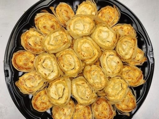 One of Nikos Lippas' favorite new items on the Niko's Catering menu is the authentic Greek cheese pies, also known as tiropita. 