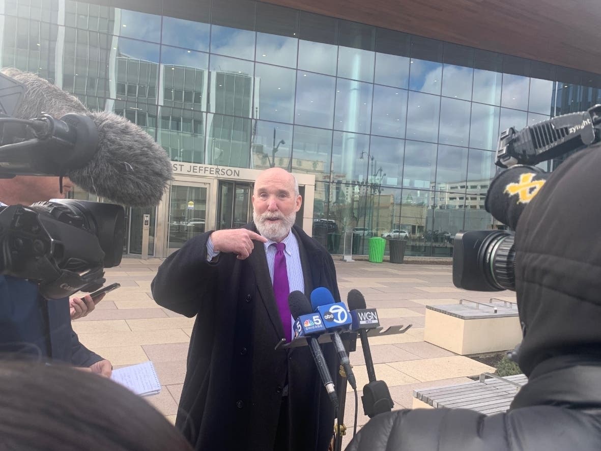 Drew Peterson's former criminal defense attorney Joel Brodsky answers questions from reporters on Wednesday morning outside the Will County Courthouse, despite a gag order being imposed against him by the Will County judge. 