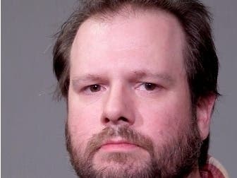 Max Gorcowski, 36, of Joliet faces charges of criminal trespass as a result of his behavior inside the Rialto Square Theater during the Dec. 12 Chris Isaak concert, court records show. 