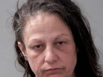 Joliet police show 47-year-old Heather Surdey as residing in Bonfield. She was also jailed in November by the Will County Sheriff's Office, the jail logs show. 
