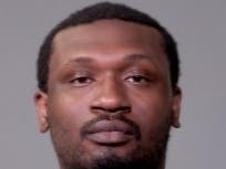 Shaquille Eubanks was charged with aggravated battery to a peace officer, criminal trespass to state supported land, and two counts of resisting/obstructing a peace officer.