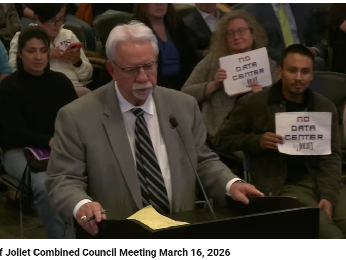 Joliet attorney David Silverman, just minutes before midnight, returned to the podium to address the Joliet City Council. Silverman represents the data center developers. 