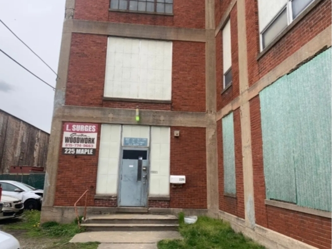 The elevator did not contain devices intended to prevent falls from the elevator platform, the lawsuit asserted.