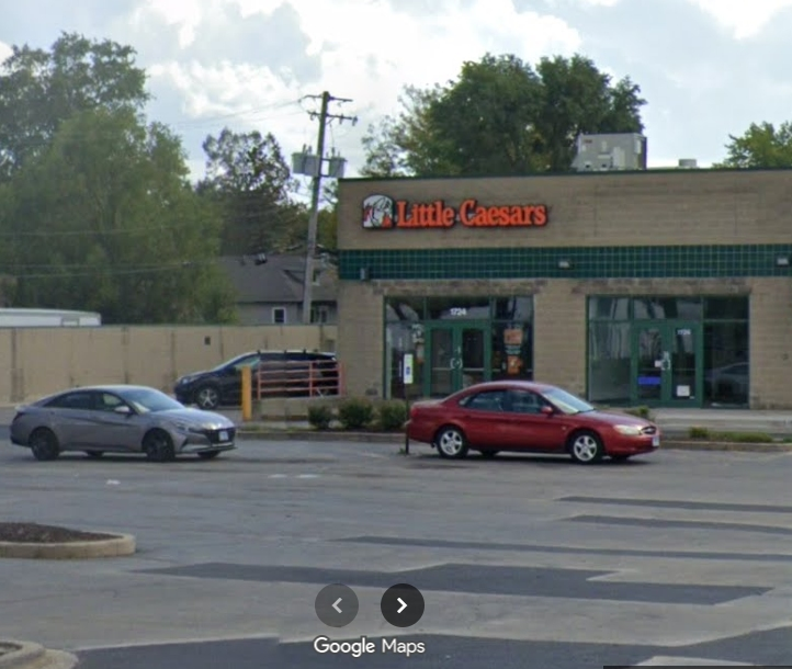 The Joliet Little Caesar's Pizza is in the strip mall at the city's busiest intersection, Larkin Avenue and West Jefferson Street. 