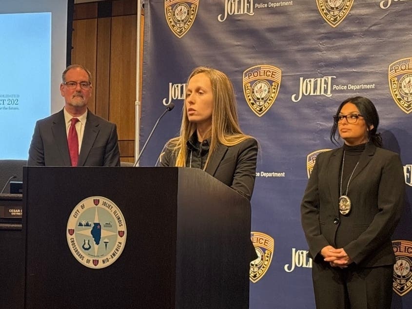 Joliet Police Detective Kristi Petro speaks at Monday's press conference held on the second floor of Joliet City Hall. 