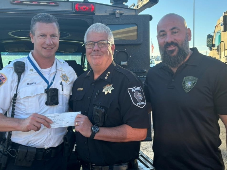 In this Sept. 26, 2024 photo are Joliet Police Sgt. Matt Breen, Elwood Police Chief Fred Hayes and Joliet Police Lt. Jeremy Harrison supporting the 100 Club of Will County. 