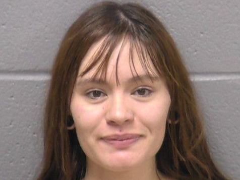 The incident leading to Ingrid Acosta Villarraga being taken away in the back of a squad car happened at 7:36 p.m.