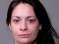 Brittany Muhealddin, age 38, remains in the Will County Jail as of Tuesday morning. She comes from Joliet's Garfield Street apartment units.