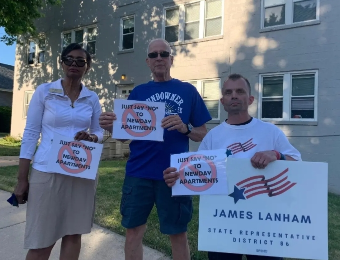From left: Diane Harris, John Sheridan and Jim Lanham stand outside 1000 Cora Street in Joliet. NewDay Apartments has five out-of-town child sexual predators living here during this June of 2022 interview.