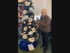 Susan Ortins was the 2023 proud winner of the "Happy Holidays" tree donated by DEEP. 