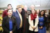 RCC President Dr. Michael Baston with Timothy Cardinal Dolan, students and staff. 