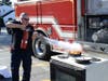 EMFD Fire Inspector and Ex-Chief James Kane demonstrates how to put out a stove fire using a fire extinguisher. 