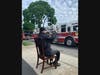 Ex-Chief Butera watches the parade that honored his service to the East Meadow community and our nation.
