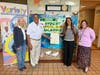  Supervisor Saladino presents a citation to mark the occasion of Variety's 60th anniversary. Left to right: Donna Cantrell Gerzof, Variety’s Board of Trustees; Supervisor Saladino; Janet Koch, CEO; and Cynthia Seiden, principal of Variety's Syosset campus