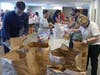 Volunteers Loading Food Bags for Distribution