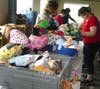 Volunteers Pack Hugs Pillows