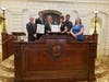 Rep. Robertson, Jeff Hull, Bruce Tarr, Terri Marciello, and her family