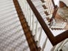A stair runner from Toms Price in a Lake Forest residence. Stair runner installation is a specialty at Toms Price.