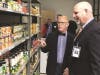 Superintendent of Schools Dr. Brian V. Hightower, left, and Cherokee HS Principal Todd Miller tour the food pantry, which will serve the school’s families in need.