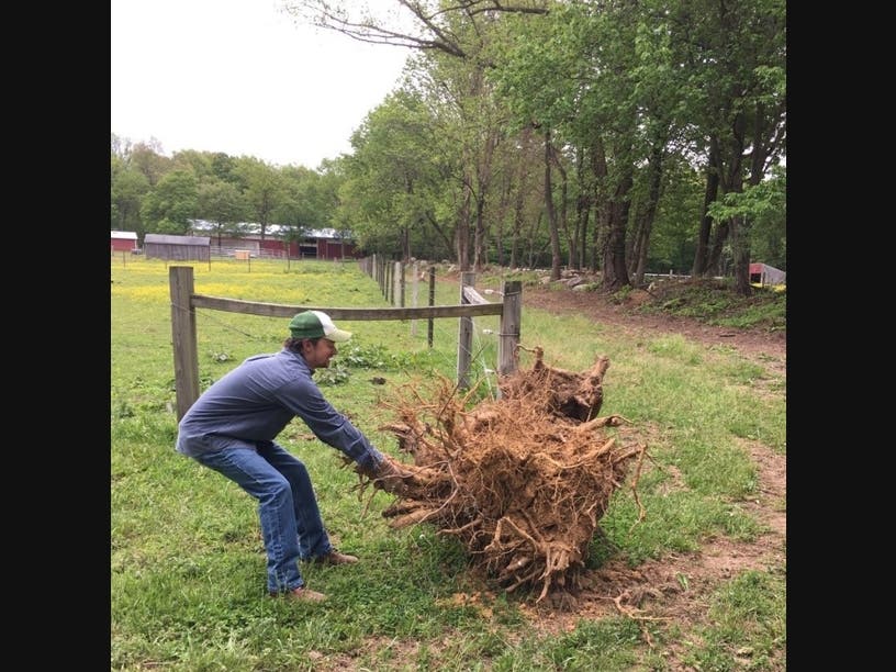 Corey Briggs helps with farm upkeep for Project Horses for Forces.