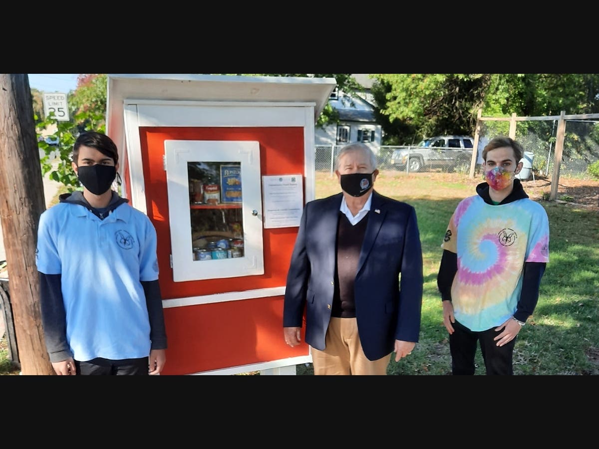 From left to right: Andrew Demcher, Mayor Robert Fazen, Dale Brochinsky standing in front of the "Little Free Pantry" in Mariposa Park.