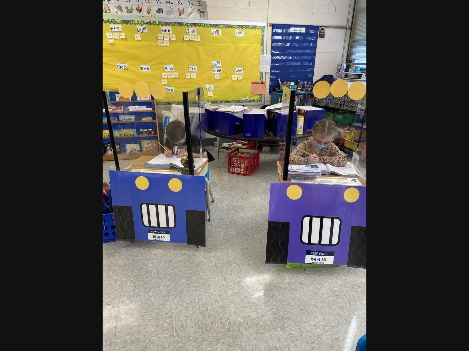 First-grade teachers Jen Giordano and Jessica Petroglia at East Islip’s Connetquot Elementary School recently turned safety shields that were installed on students’ desks into Jeeps.