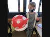 Northside third grader Riley Hamilton transformed his balloon into a mushroom from Mario.