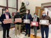 Some of Great South Bay YMCA’s leadership team preparing to deliver holiday gifts to local families  through the Adopt-A-Family initiative. 