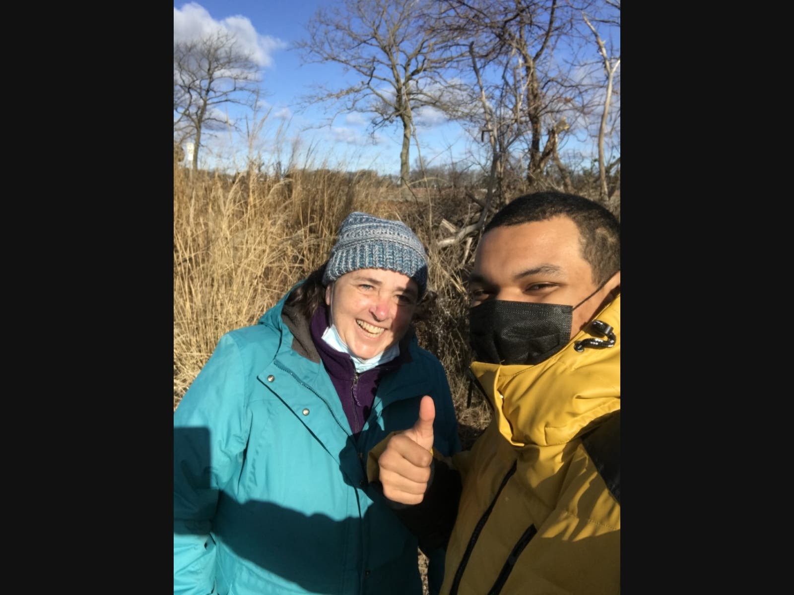 Joshua Castellanos pictured at the Sunken Meadow salt marsh with New York State Park Personnel Annie McIntyre, Regional Environmental Manager.