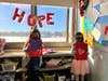 First graders in Christine Garcett’s class at Deer Park’s May Moore Primary School recently learned a lesson in kindness and “giving back” as they created handwritten letters and designed Valentine’s Day cards for senior citizens.