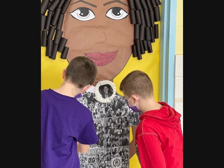Manetuck Elementary School students explored a Black History Month door created by Principal Vanessa Williams, identifying African Americans who have made history in fields such as science, health, literature, music, sports and politics.
