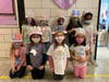 Students at William E. DeLuca Elementary School recently dressed up as 100-year-old men and women and decorated “100 Days Smarter” headbands to celebrate the 100th day of school.