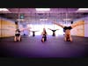 Chelsea Carter, Ricky James and Leslie Gerber practicing pole fitness and trapeze yoga.