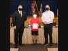 Music student Michael Costello was honored with an award from Principal Dr. James Foy and BOE Vice President Carl Cangelosi.